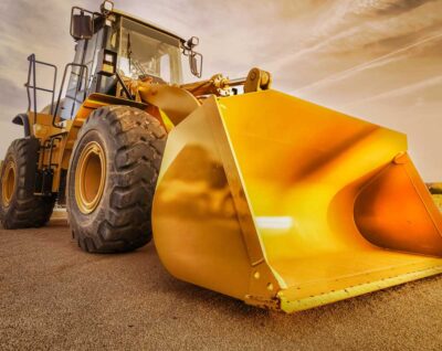 A bulldozer rediscovering a Biblical Site by the Sea of Galilee